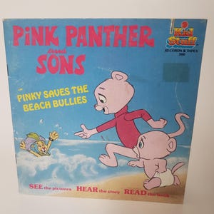 May include: A vintage record album cover featuring the Pink Panther and his sons. The cover art depicts the Pink Panther and his son Pinky on a beach with the text "Pinky Saves the Beach Bullies".