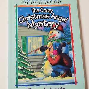 May include: A book cover featuring a child looking through binoculars at a snowman with a red hat and a green holly wreath. The book title is "The Crazy Christmas Angel Mystery" and the author is "Beverly Lewis".