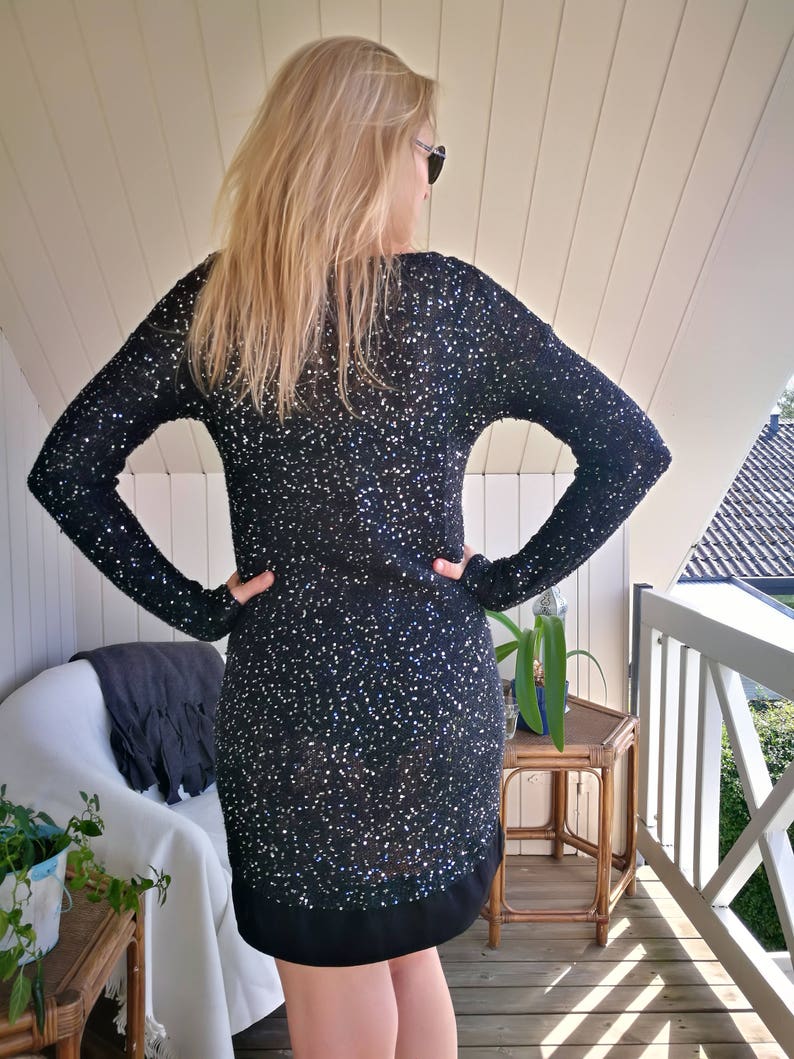 black fitted sequin dress