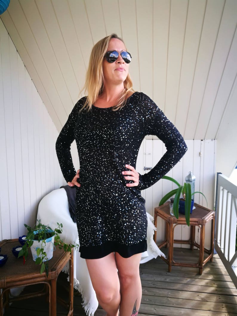 black fitted sequin dress
