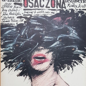 May include: Vintage Polish movie poster for "Someone to Watch Over Me" starring Tom Berenger and Mimi Rogers. The poster art depicts a woman's face with black birds obscuring her features. The film title is in Polish.