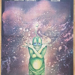 May include: Vintage Polish film poster for "Close Encounters of the Third Kind." The poster shows a green alien with crossed arms and a wide grin against a cosmic background. Text includes the film title, director Steven Spielberg, and cast.