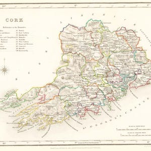 May include: An antique map of County Cork, Ireland, showing the county's boundaries and a key listing the baronies. The map is printed in black, red, green, and yellow ink on a white background.