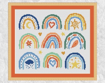 May include: A set of 12 colorful rainbow cross-stitch patterns with different designs, including a crescent moon, a heart, a sun, a flower, a cloud with raindrops, a heart, and a star.