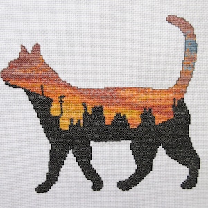 Cat cross stitch pattern, printable cat silhouette counted cross stitch, sunset, night city rooftops, pet animal, town, instant download PDF