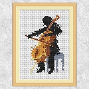 以下が含まれることがあります： チェロを弾いている人の黒いシルエット。チェロは茶色の木製のボディと薄い茶色の弓。人は灰色の椅子に座っている。