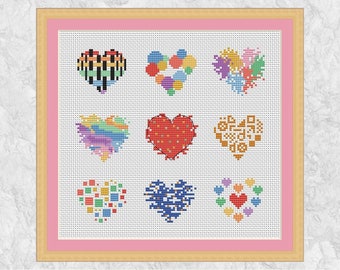 Puede incluir: Nueve corazones de punto de cruz coloridos con diferentes patrones, incluyendo arcoíris, lunares y diseños geométricos.
