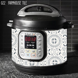 May include: A white Instant Pot with a black and white farmhouse tile design. The Instant Pot has a digital display that reads "88:88".