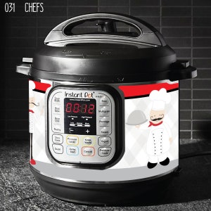 May include: A black Instant Pot electric pressure cooker with a red and white patterned design featuring a cartoon chef. The digital display shows "88:88".