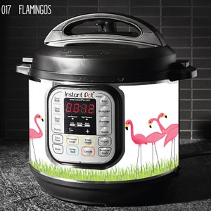 May include: A white Instant Pot Duo featuring a pink flamingo design. The Instant Pot has a digital display showing "88:88" and a variety of buttons, including "Soup", "Meat", "Bean/Chili", "Poultry", "Slow Cook", "Sauté", "Pressure Level", "Keep Warm", "Delay Start", "Cancel", and "Pressure Cook".