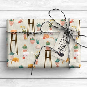 May include: A gift wrapped in brown paper with a cat and plant pattern. The paper is tied with twine and a tag that reads "Purrfect Paper" with a cat illustration.