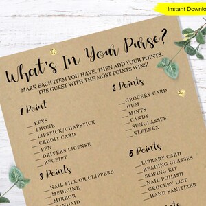 May include: A printable game card titled "What's In Your Purse?" on a kraft paper background. The game lists items like keys, phone, and lipstick, with point values assigned to each. The card includes the text "Instant Download".