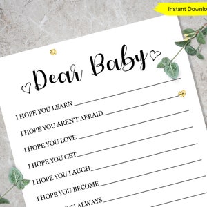 May include: Printable "Dear Baby" letter with blank lines for writing hopes and wishes for a newborn baby. The letter is on white paper with black text and a heart symbol.