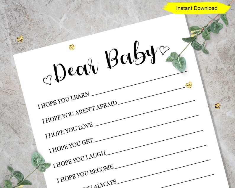May include: Printable "Dear Baby" letter with blank lines for writing hopes and wishes for a newborn baby. The letter is on white paper with black text and a heart symbol.