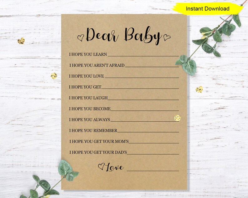 May include: A printable baby shower game card with the text "Dear Baby" and a list of things the guest hopes the baby will learn, love, get, laugh, become, always, remember, and get from their mom and dad. The card has a brown background and a heart design.