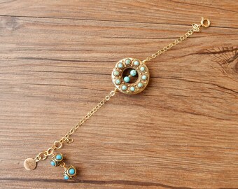 Bracelet style bohème avec chaîne en argent doré et perle tibétaine au centre (laiton et turquoise)