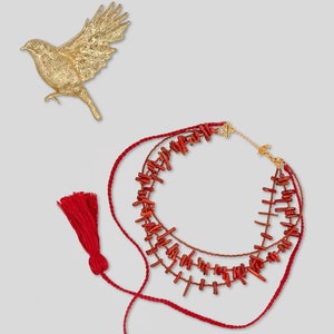 Ukrainian jewelry set: natural corals with gilded locks and water-resistant Moulin tassels. The necklace is 13.3 inches in length, with an additional 2.3 inches extension The earring secured with a figure 8 clasp by NiGramaDramy