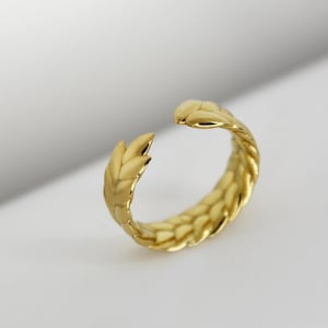Handmade ring crafted from gold plating.  Universal ring size that can be adjusted and is made in Ukraine.