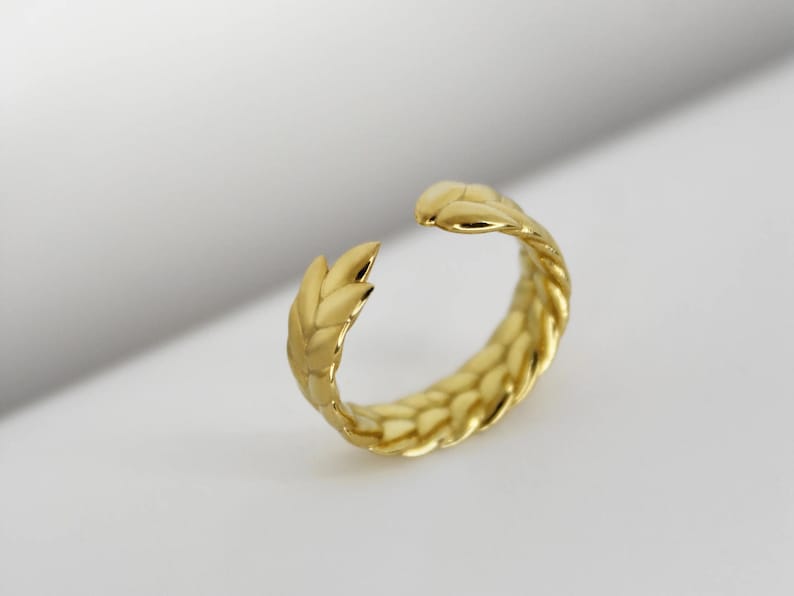 Handmade ring crafted from gold plating.  Universal ring size that can be adjusted and is made in Ukraine.