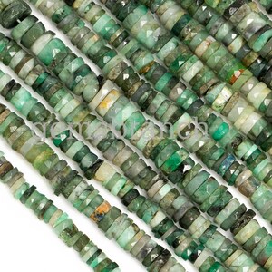 May include: A strand of emerald green gemstone beads, each bead is faceted and has a unique shape. The beads are arranged in rows, creating a textured and visually appealing pattern.