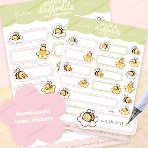 May include: A sheet of bee-themed label stickers with a pink and green background. The stickers feature bees, flowers, and the text "ducks & daffodils label sticker sheet" and "bumblebutt label stickers".
