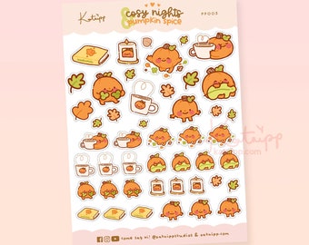 May include: A sheet of stickers featuring a variety of cute pumpkin illustrations. The stickers are designed with a cozy autumn theme and include images of pumpkins holding mugs, books, and candles. The text "cosy nights pumpkin spice" is featured at the top of the sheet.