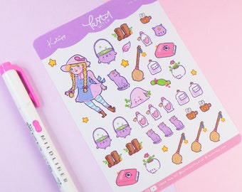 Puede incluir: Una hoja de pegatinas con una bruja de dibujos animados con un sombrero rosa, una caldera morada, una escoba y otros artículos de bruja. Las pegatinas están sobre un fondo blanco con un borde rosa. El texto "Pastel Witch" está escrito en rosa en la parte superior de la hoja.