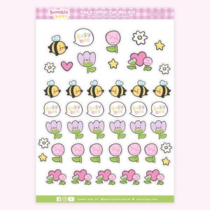May include: A sheet of planner stickers featuring a bee theme with the text "Busy Bee" and illustrations of bees, flowers, and hearts. The stickers are on a white background with a light pink border.