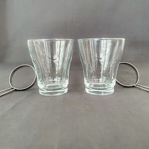 Par de tazas/vasos de café/té con base plateada extraíble de Bormioli Rocco Oslo