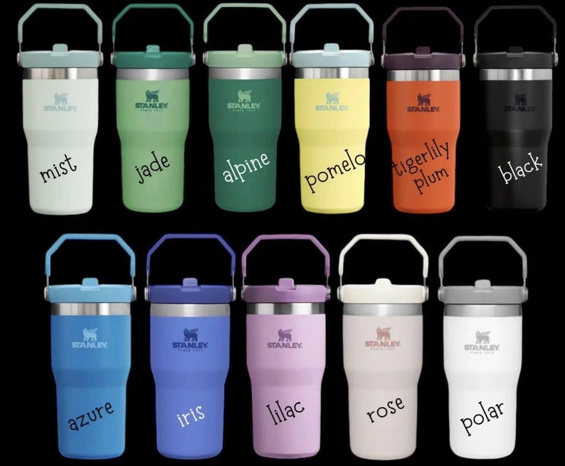 May include: Twelve Stanley brand insulated tumblers with handles in various colors, including mist, jade, alpine, pomelo, tigerlily plum, black, azure, iris, lilac, rose, and polar.