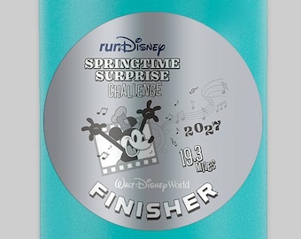 May include: A teal Takeya water bottle with a black lid and handle. A circular sticker features the runDisney Springtime Surprise Challenge 2027 logo, a graphic of Mickey Mouse, musical notes, the text 19.3 Miles, and the word Finisher.