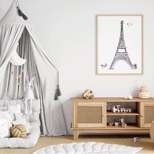 Three Paris inspired line art drawing of Eiffel Tower in frames in playroom