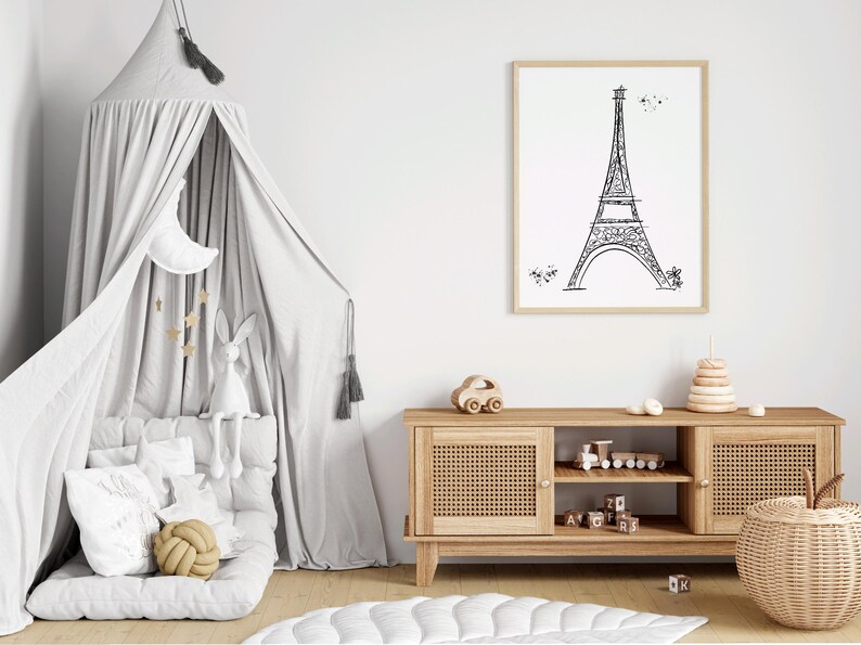 Three Paris inspired line art drawing of Eiffel Tower in frames in playroom