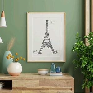 Three Paris inspired Eiffel Tower line art drawing in frame in entryway
