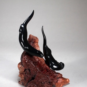 River Otter Duo Sculpture by John Perry on polished burlwood base. Signed.