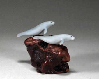 Manatee Duo by John Perry 5 inch long airbrushed sculpture on burlwood base. Signed