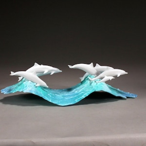 Dolphin School by John Perry  on blue waves 15in long Pellucida Sculpture Figurine