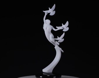 Lady with Doves Sculpture by John Perry 17 inches tall Pellucida on polished black base.