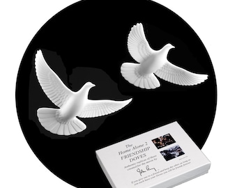 Home Alone 2 Dove Pair Authentic Replicas by John Perry who made them for the movie.  Gift Boxed