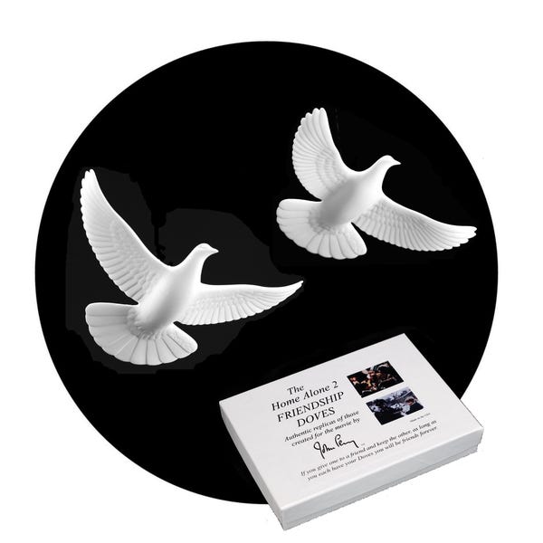 Home Alone 2 Dove Pair Authentic Replicas by John Perry who made them for the movie.  Gift Boxed