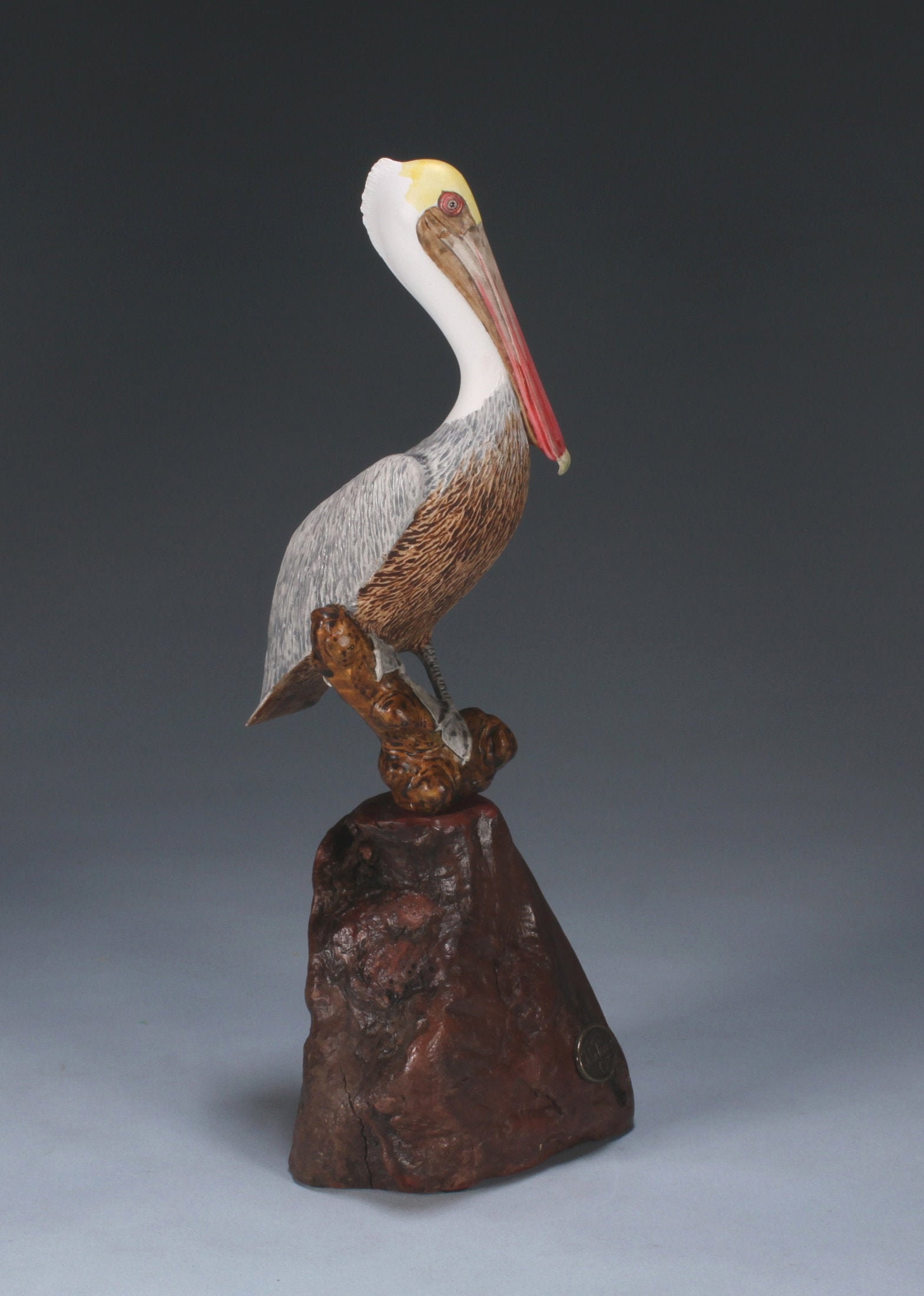 Pelican Sculpture by John Perry Brown 10 inches tall on burlwood base Statue