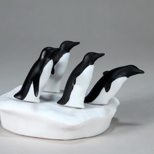 4 Penguins Sculpture by John Perry on Ice Floe 5in long Figurine