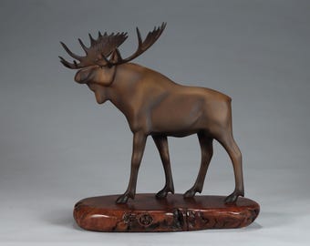 Moose by John Perry 9 in high Airbrushed on polished burlwood base. Signed.