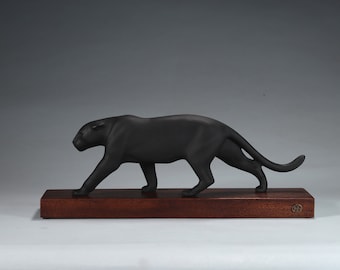 Black Panther sculpture by John Perry Mahogany base 14 inches long. Signed.