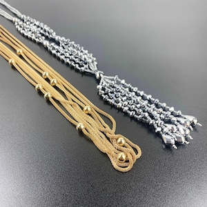 Vintage Metallic Beaded Necklace Set: Silver Teardrop & Gold Chain, Set of 2