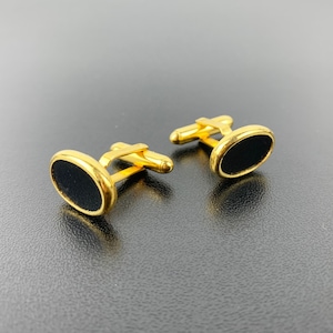 Christian Dior mid century gold plated and onyx cuff links | 1960's designer cuff links | vintage collectible cuff links