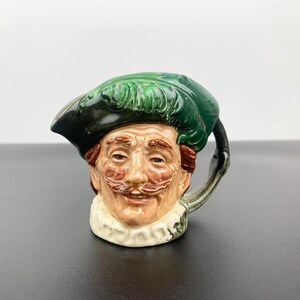 Royal Doulton small character jug The Cavalier &#39;A&#39; mark | Harry Fenton The Cavalier fictional character jug | collectible character jug
