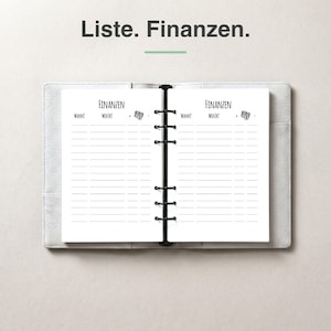 Könnte beinhalten: Ein offener Ringbuchplaner mit sechs Ringen und weißen Seiten, die mit der Überschrift Finanzen sowie den Spalten Wann, Wofür und einem Geldsymbol versehen sind. Darüber steht der Text Liste. Finanzen. Der Einband ist hellgrau texturiert.