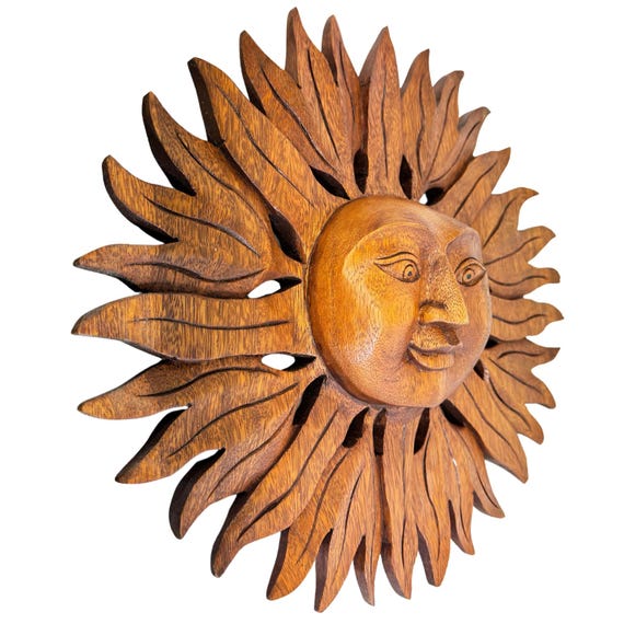 Carved Oak Sunburst with Center Face Wall Mounted Coat Rack Carved Oak Sunburst with Center Face Wall Mounted Coat Rack