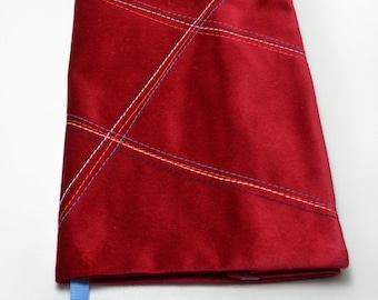 Adjustable velvet notebook cover in burgundy.